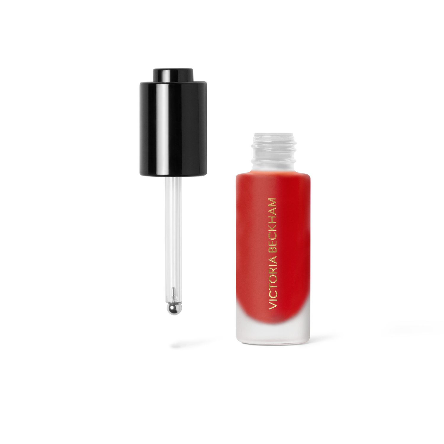 Image of an open Victoria Beckham Beauty Coral variant: Coral