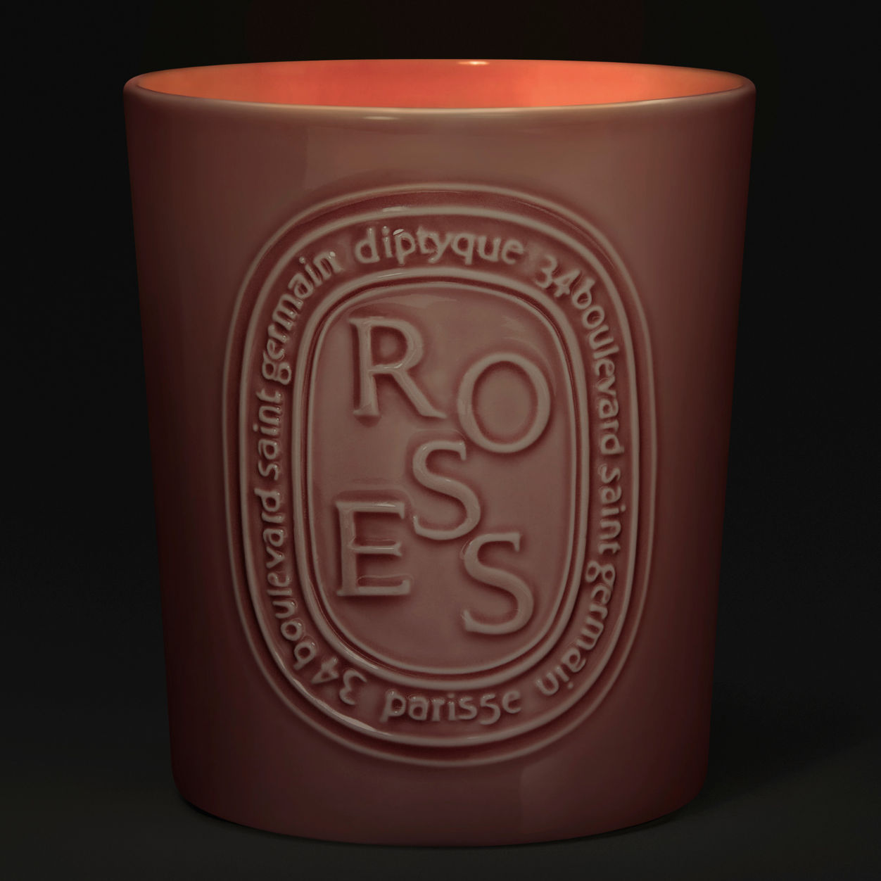 Lifestyle image of Diptyque Roses Candle variant: 21.2 oz (Large)