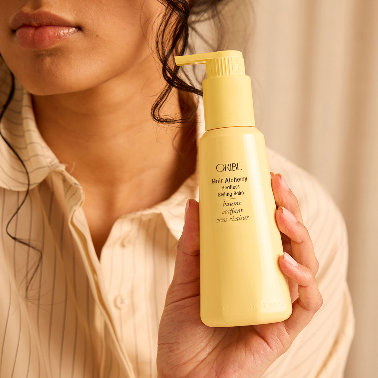 Model image of Oribe Hair Alchemy Heatless Styling Balm variant: Default Title