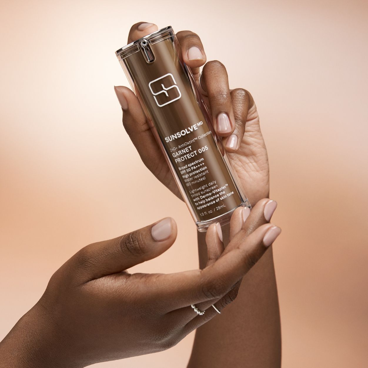 Lifestyle image of SunsolveMD ZnO+ AntiOxtint Garnet Protect 005 SPF 50 variant: Garnet Protect 005