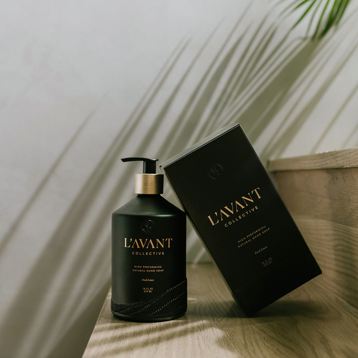 Lifestyle image of L’Avant Collective Fresh Linen Hand Soap variant: Glass Bottle (16 oz.)