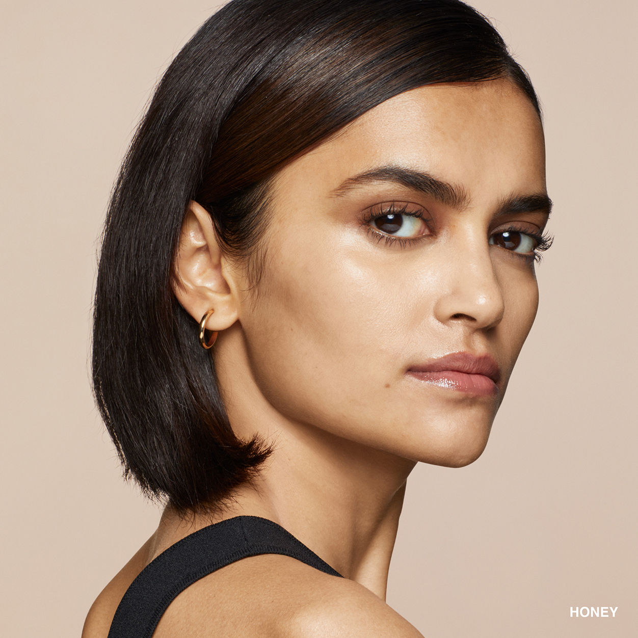 Model image of Bobbi Brown Skin Concealer Stick variant: Honey