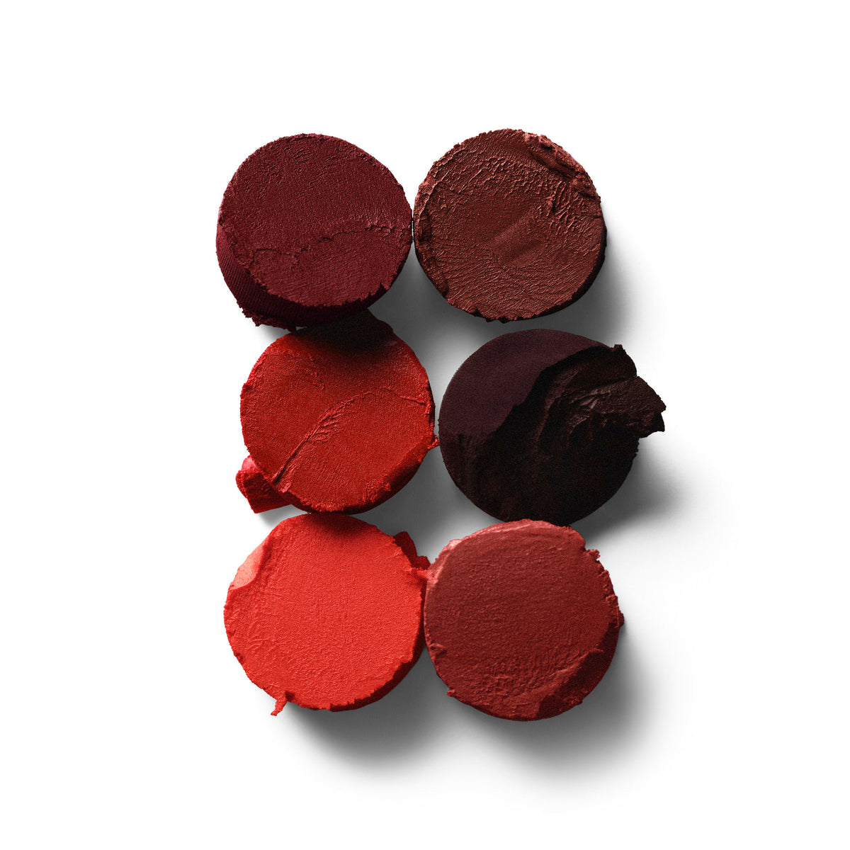 A shade comparison of variant: House Red - A classic pure red and Victoria’s go-to for a bold red lip