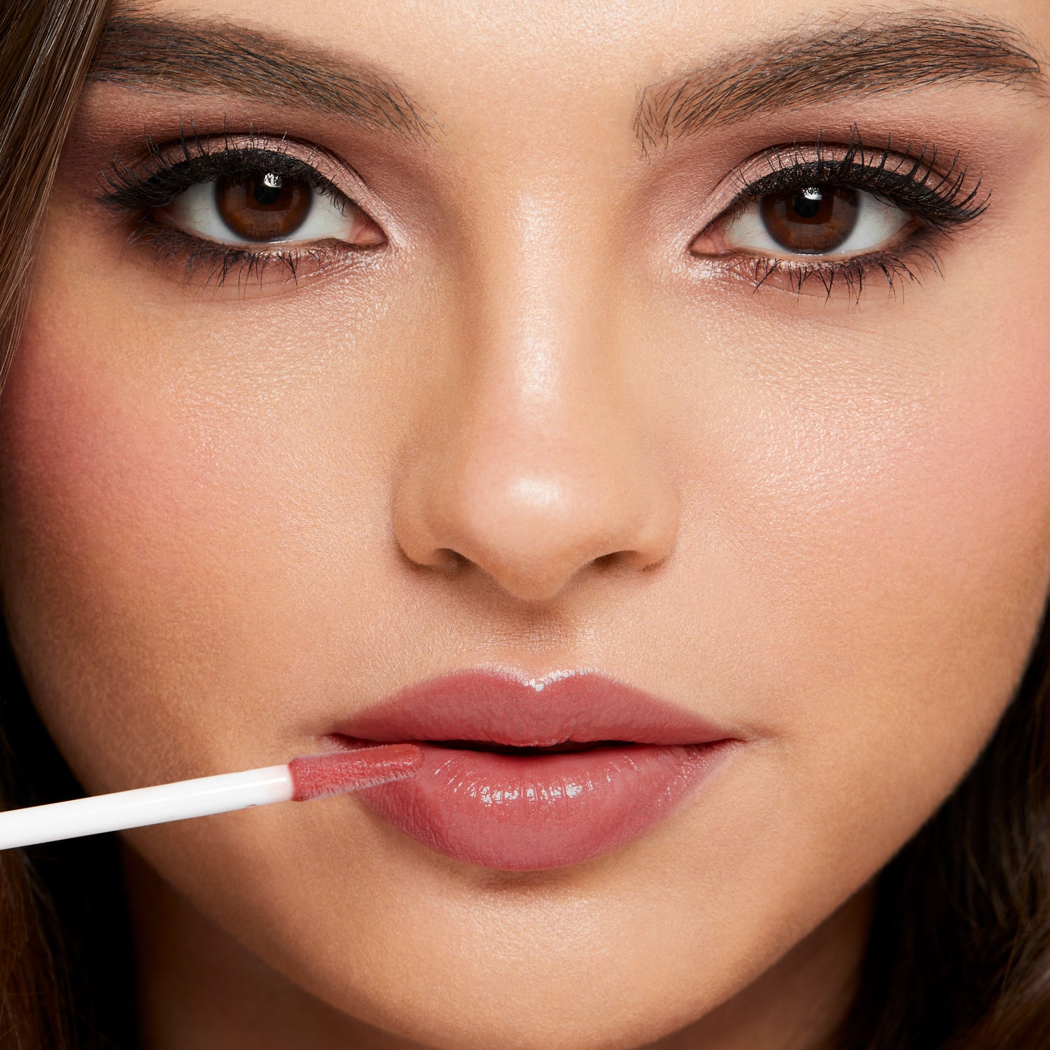 Model image of Trish McEvoy Easy Lip Gloss variant: Knockout (Vermillion)