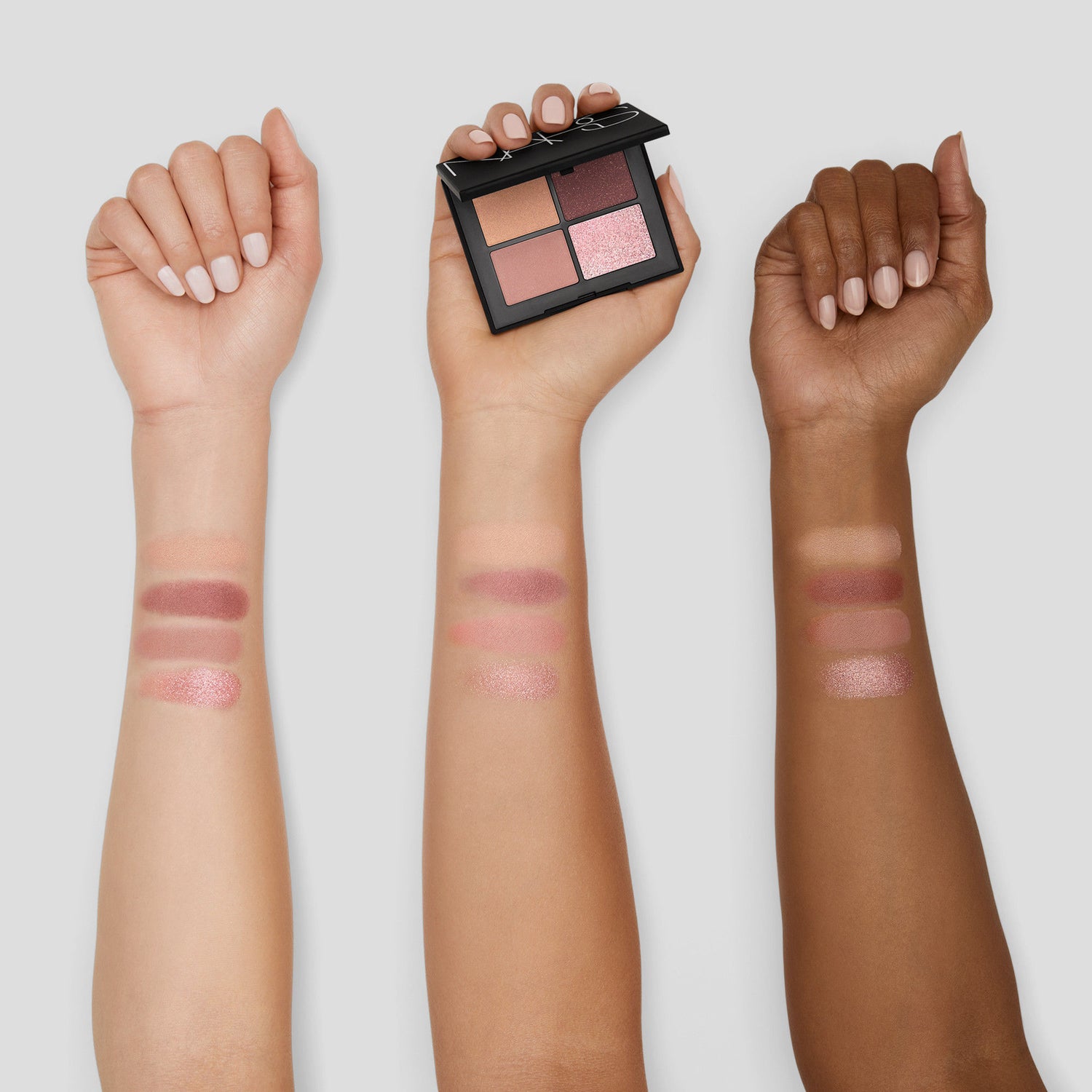 An arm swatch of Nars Quad Eyeshadow variant: Kuala Lumpur
