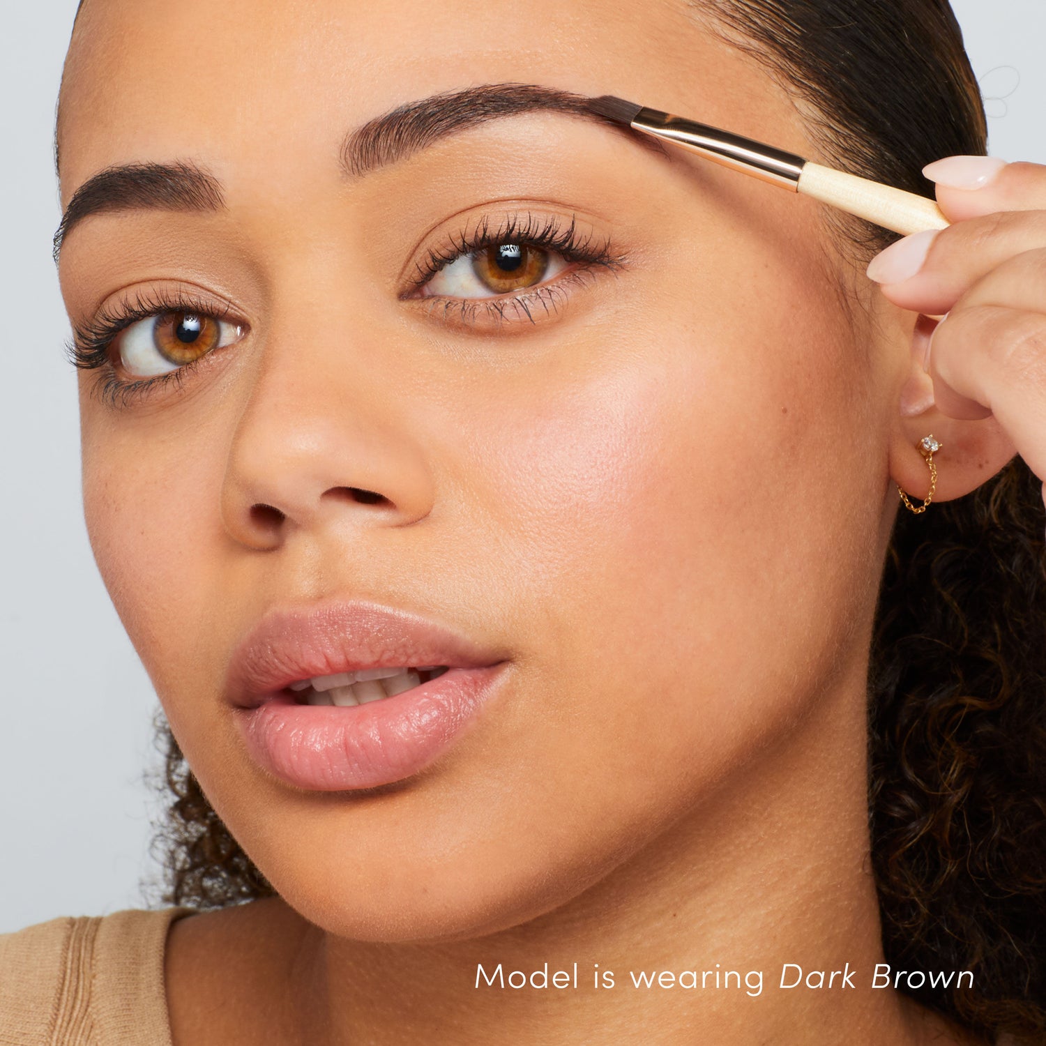 Model image of Jane Iredale PureBrow Brow Powder variant: Medium Brown