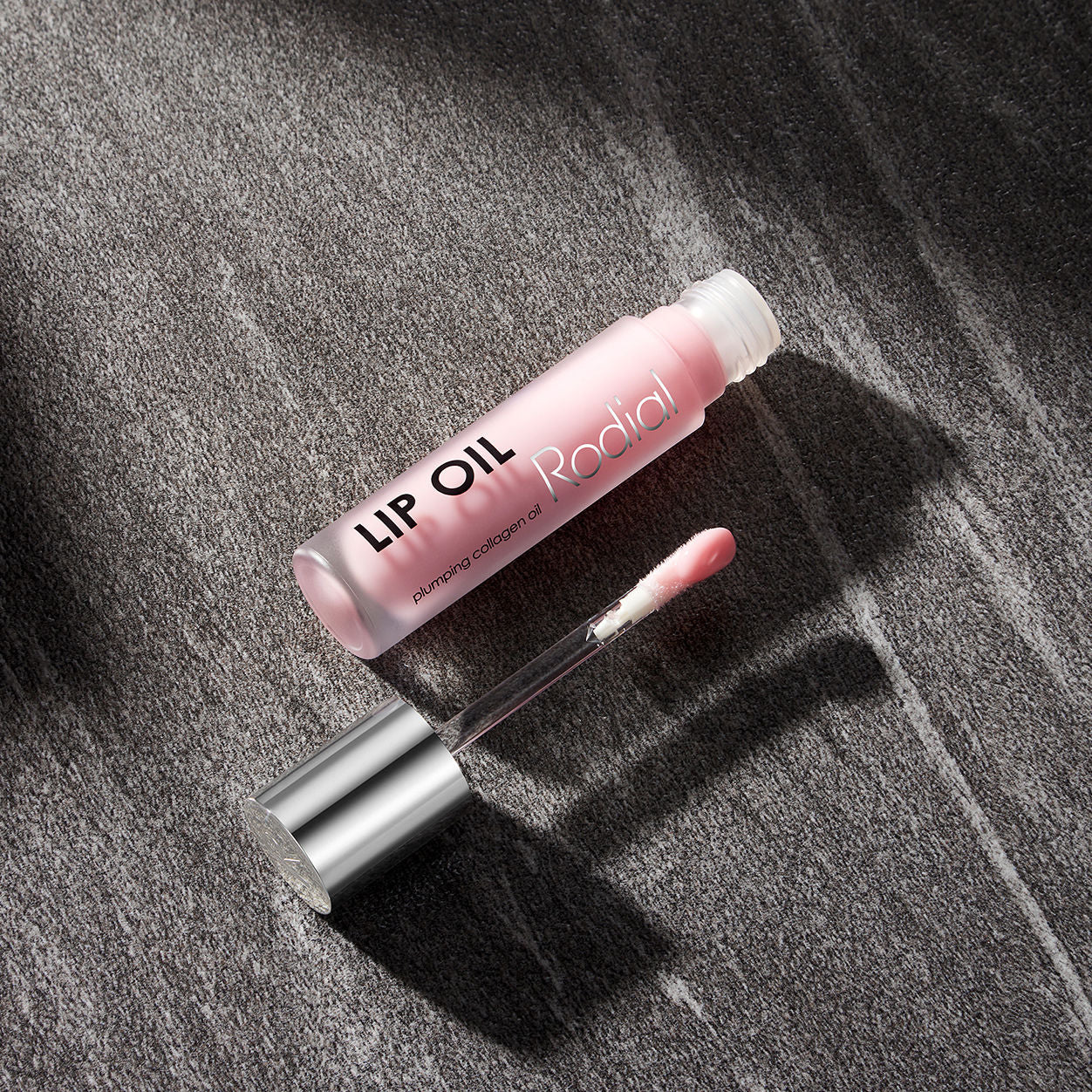 Lifestyle image of Rodial Lip Oil variant: Original Pink