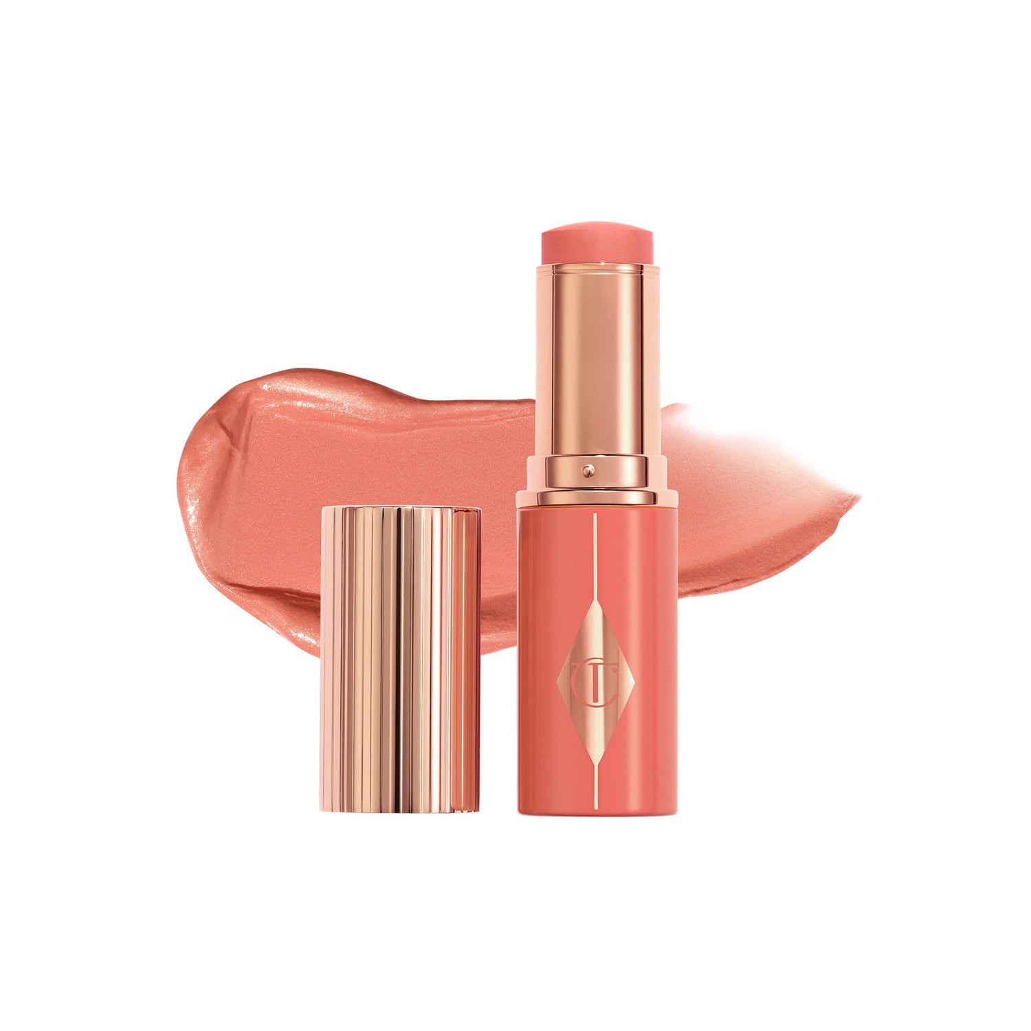 Swatch image of Charlotte Tilbury Unreal Lip + Cheek Glow Blush Stick with Hyaluronic Acid variant: Peachy Glow