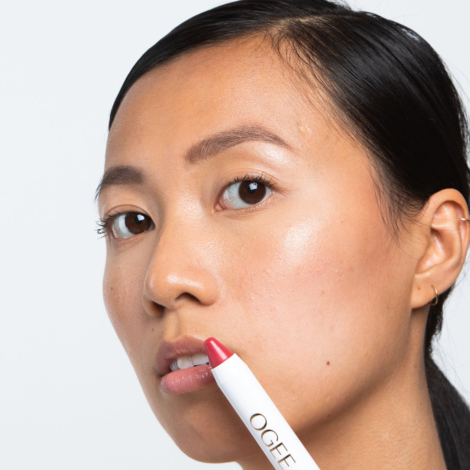Model image of Ogee Tinted Sculpted Lip Oil variant: Petunia