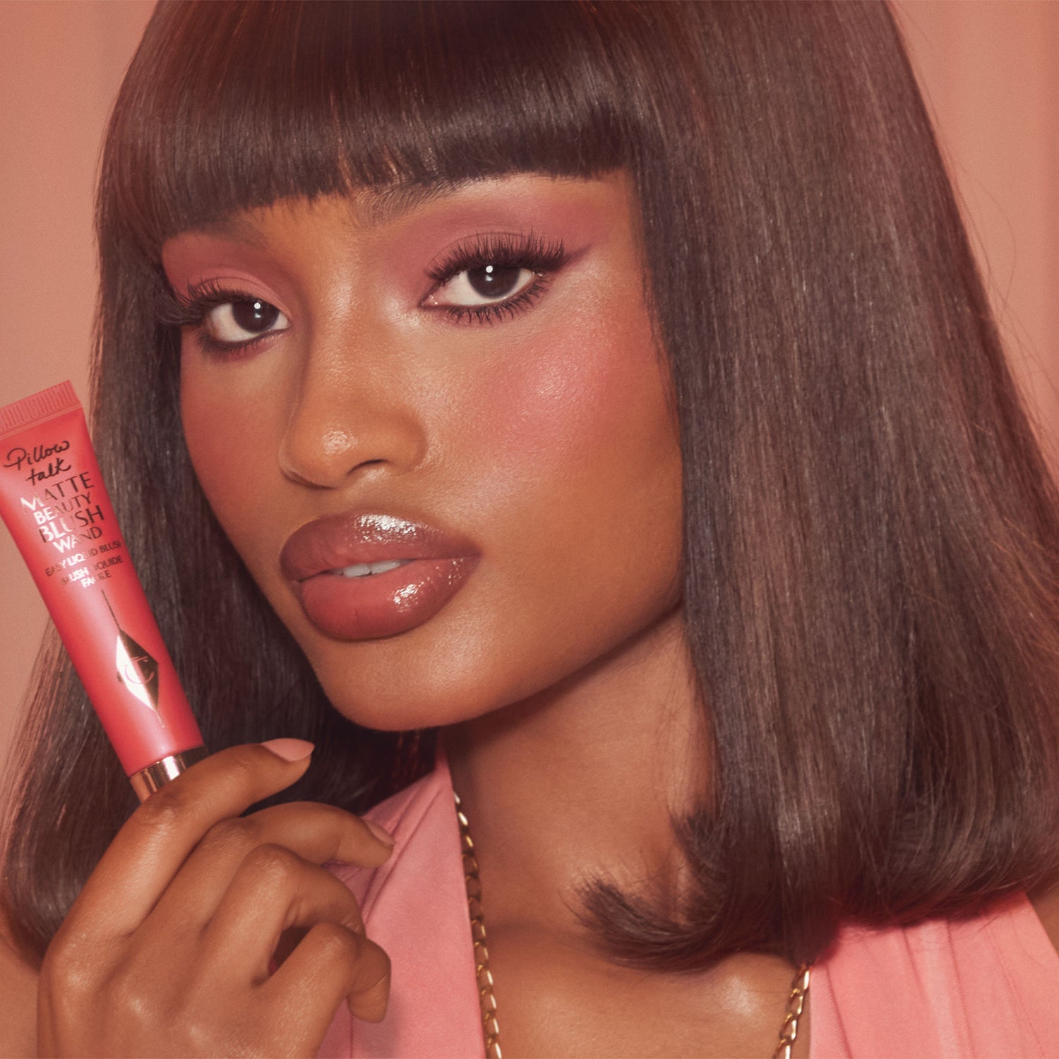 Model image of Charlotte Tilbury Matte Beauty Blush Wand variant: Pillow Talk Dream Pop