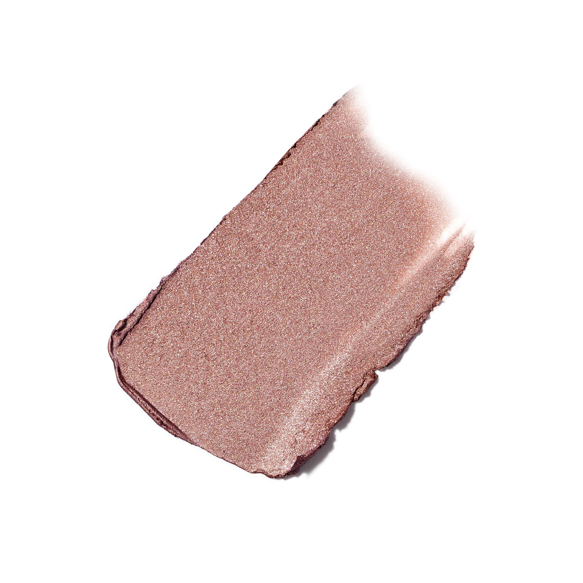 A swatch of shimmering, metallic rose-gold ColorLuxe Eye Shadow Stick cream-to-powder eyeshadow.