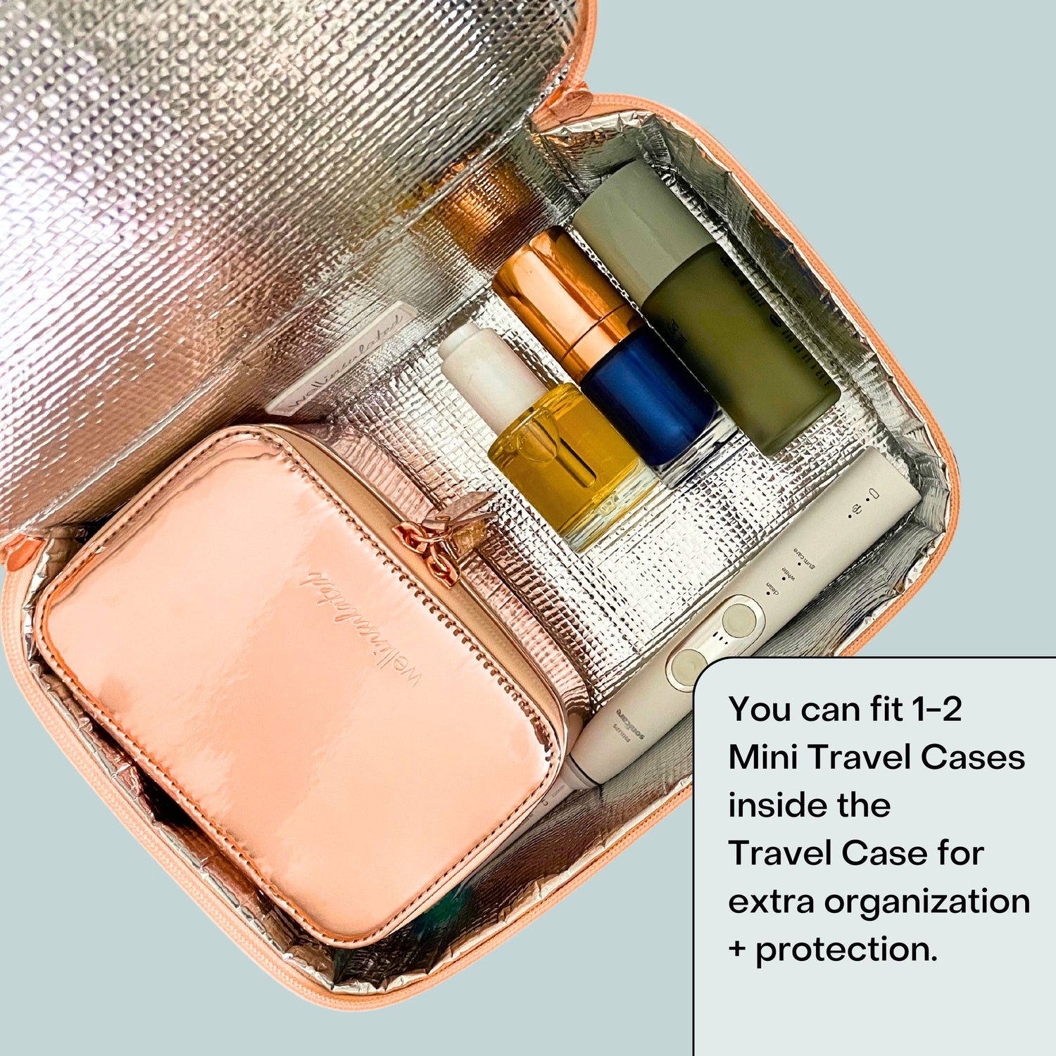 Lifestyle image of Wellinsulated Performance Mini Travel Case variant: Rose Gold
