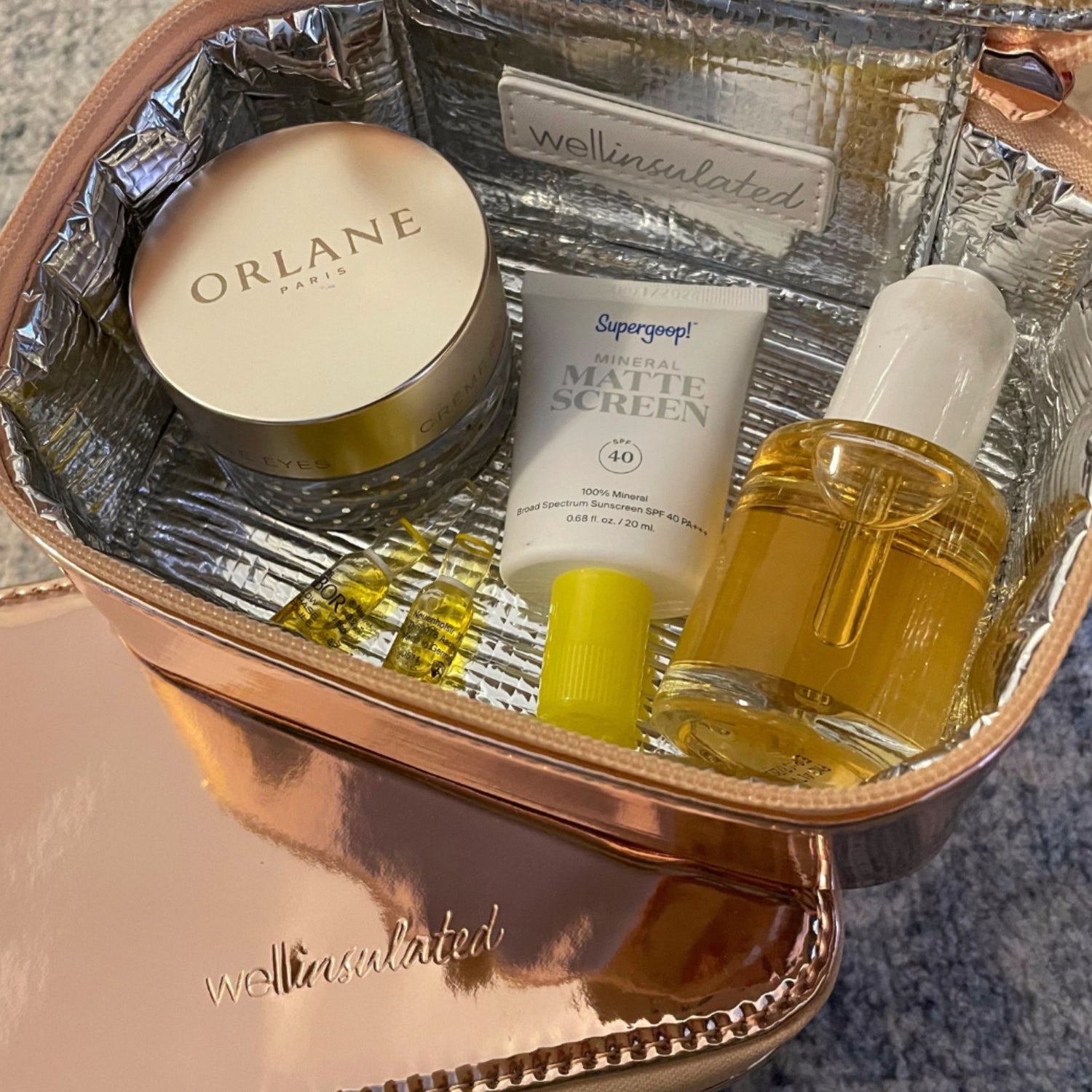 Lifestyle image of Wellinsulated Performance Mini Travel Case variant: Rose Gold