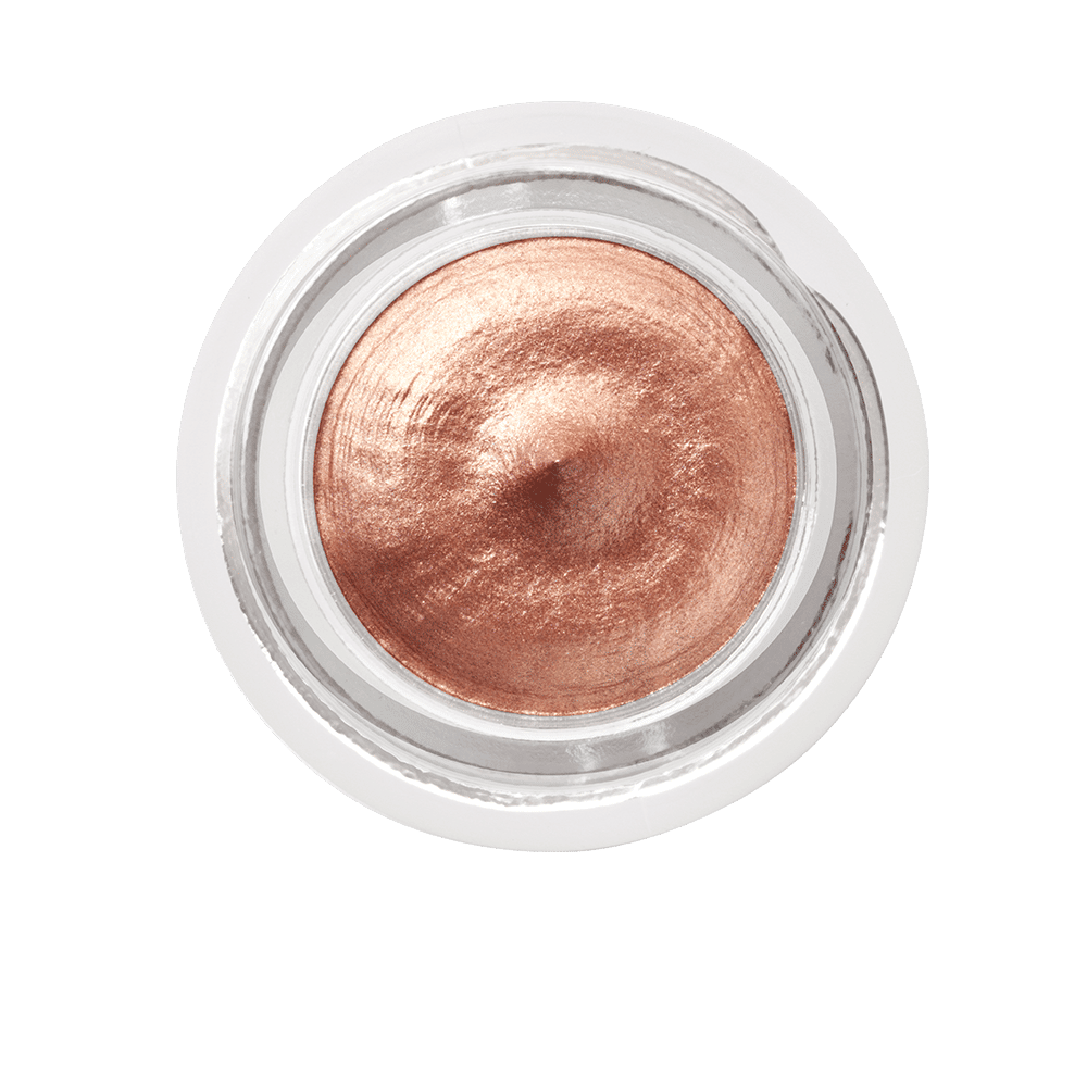 Top-down view of a small glass jar of Charlotte Tilbury Eyes To Mesmerise, filled with long-lasting, shimmery copper cream eyeshadow.
