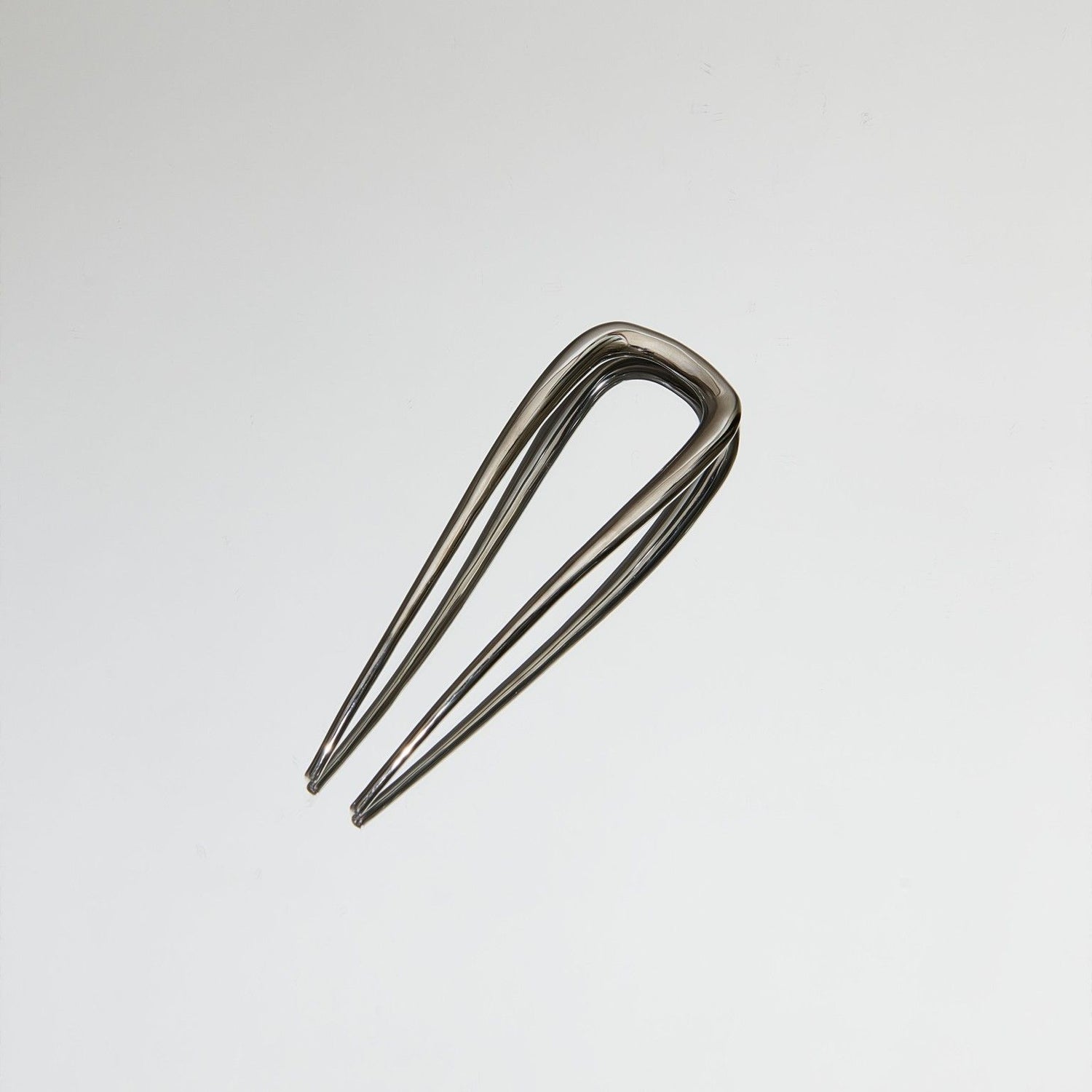 Lifestyle image of Deborah Pagani Small DP Pin variant: Silver