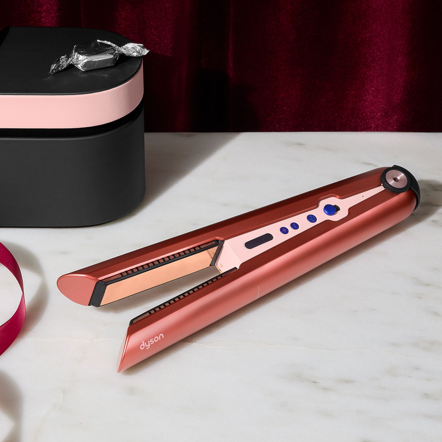 Lifestyle image of Dyson Corrale Hair Straightener variant: Strawberry Bronze and Blush Pink (Special Edition)