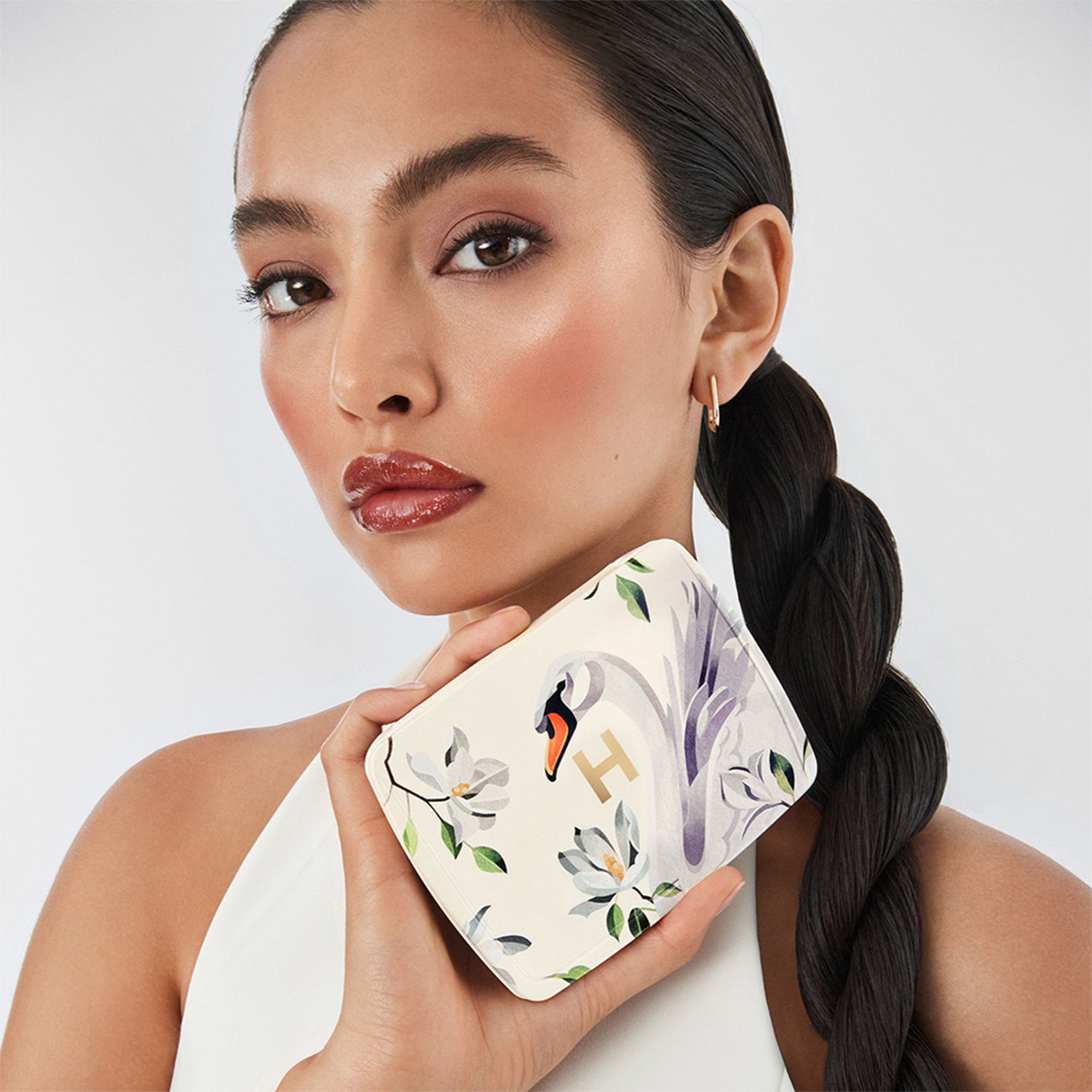 Image of a closed Hourglass Ambient Lighting Edit - Unlocked (Limited Edition) variant: Swan