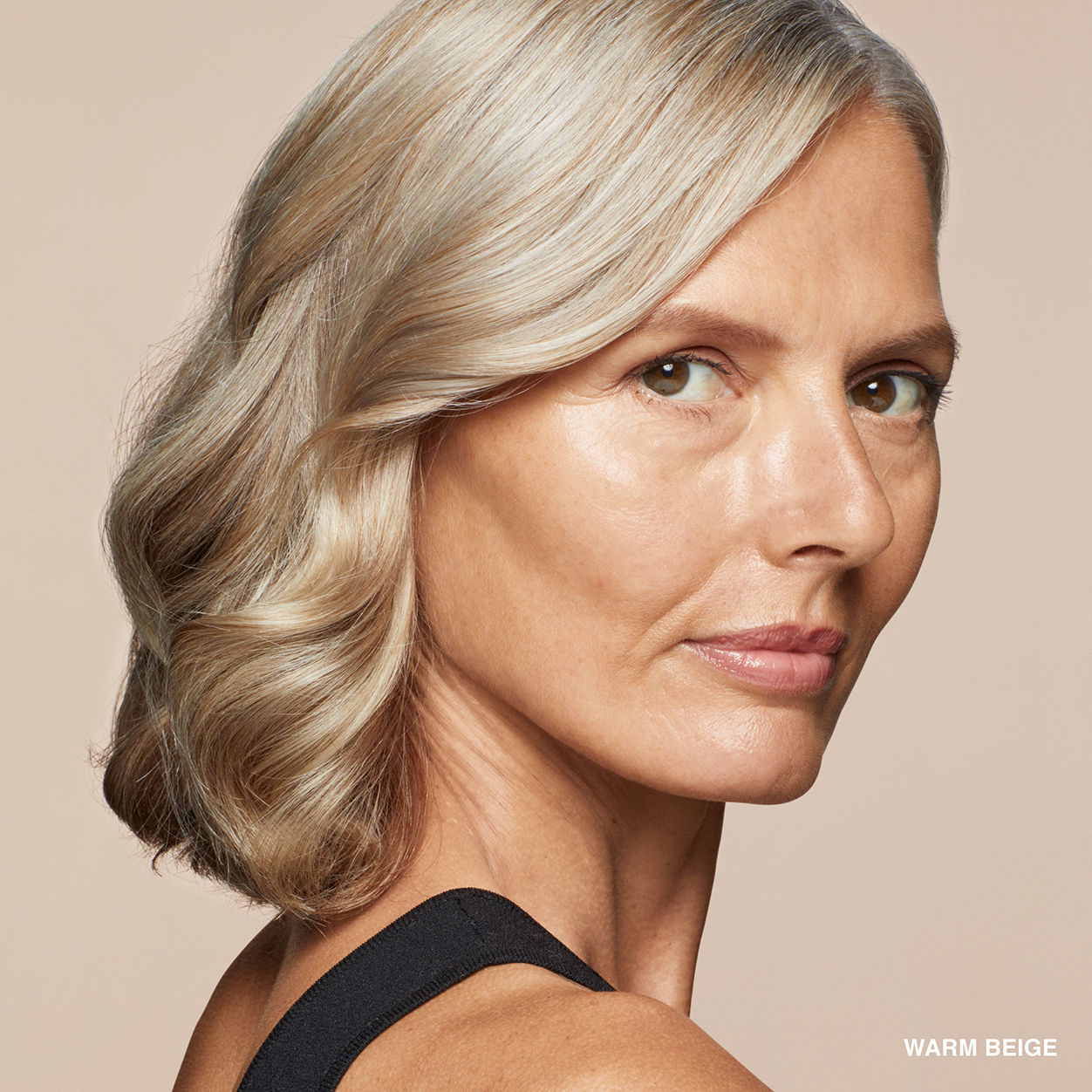 Model image of Bobbi Brown Skin Concealer Stick variant: Warm Beige