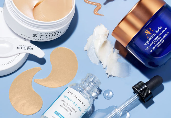 skincare products on blue background