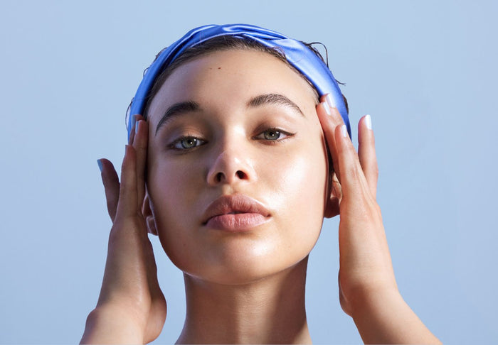 woman with finger on her temples