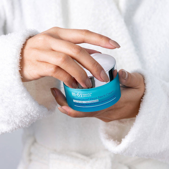 woman holding m-61 neck cream