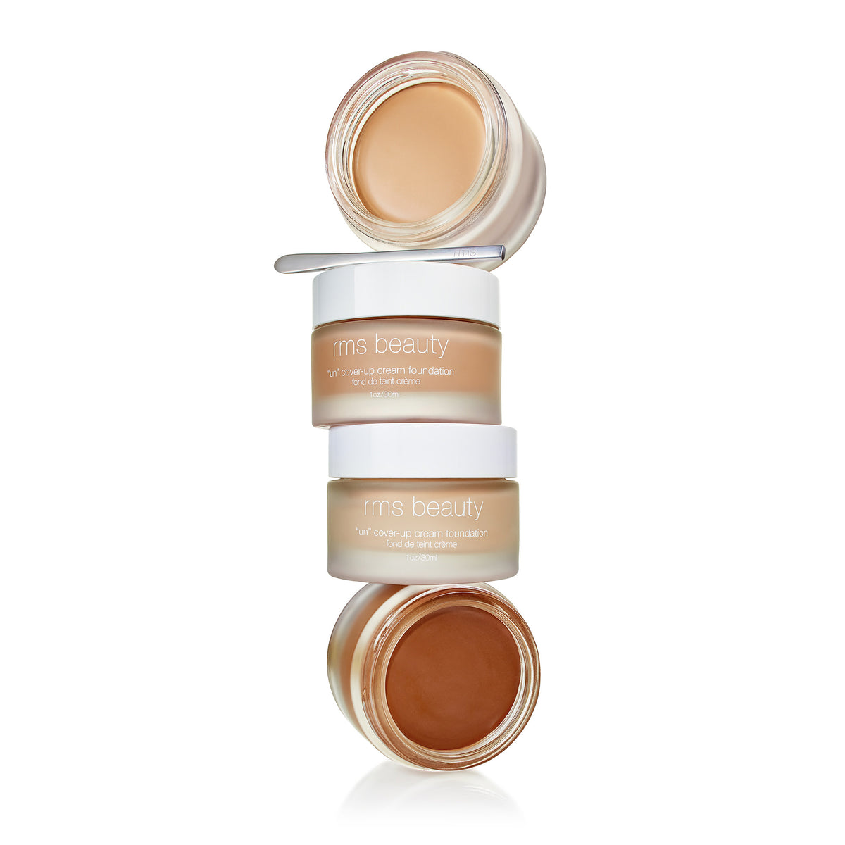 RMS Beauty UnCoverup Cream Foundation . This product is for medium warm beige complexions