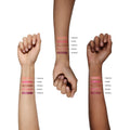 An arm swatch of Victoria Beckham Beauty Blush Stylus