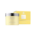 Image of an open Molton Brown Orange and Bergamot Radiant Body Polisher