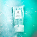 Lifestyle image of R+Co Waterfall Moisture and Shine Lotion
