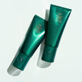 Lifestyle image of Oribe Straight Away Smoothing Blowout Cream for Curly Hair