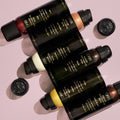 Lifestyle image of Oribe Airbrush Root Touch-Up Spray for Gray Coverage & Root Concealer