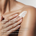 An arm swatch of Element Eight O₂ Tranexamic Acid Depigment Nourish Body Cream