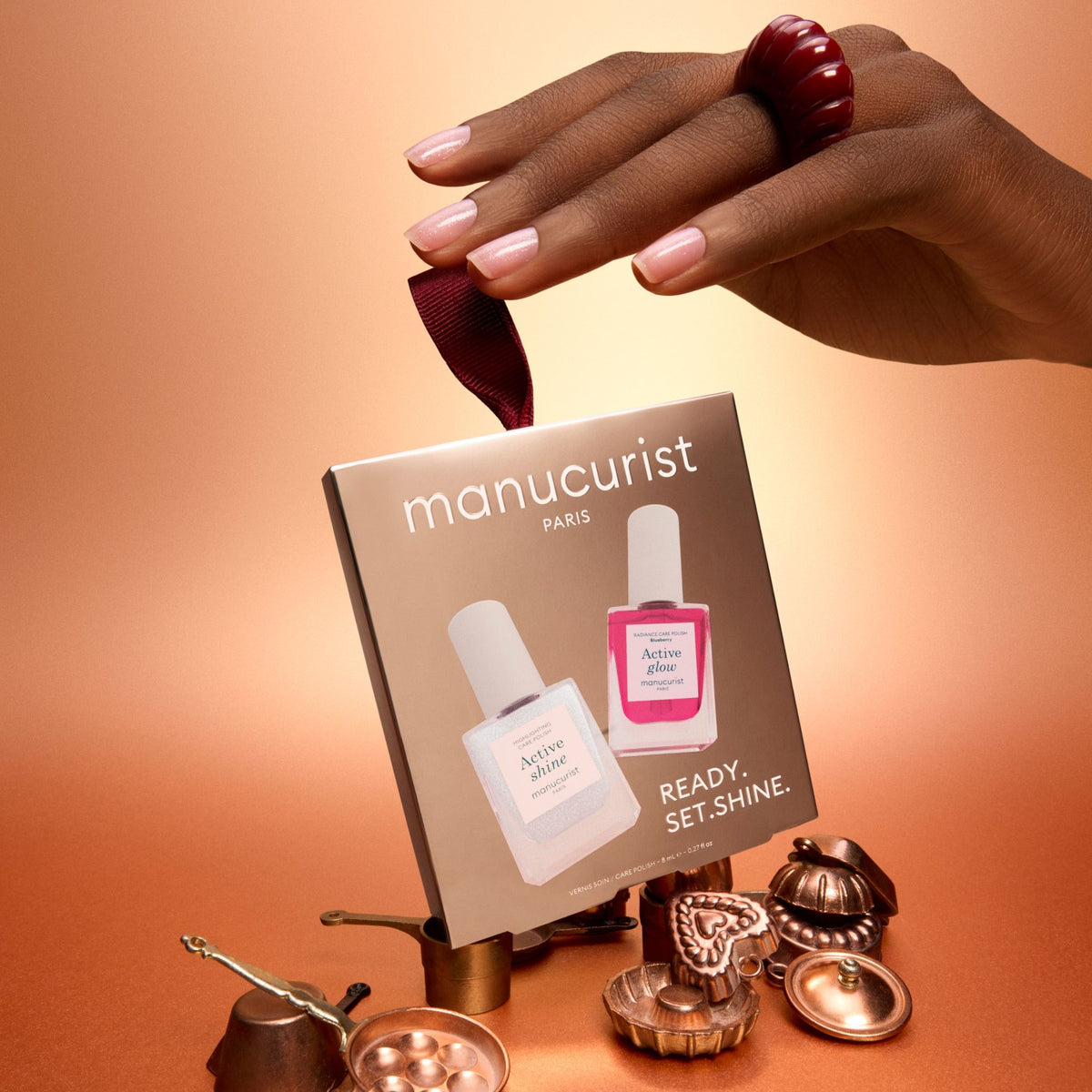 Lifestyle image of Manucurist Mini Active Nail Polish Duo (Limited Edition)