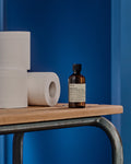 Lifestyle image of Aesop Post-Poo Drops