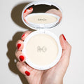 Lifestyle image of R+Co Picture This Dry Texture Balm