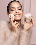 Model image of Laura Mercier Divinely Flawless Translucent Loose Setting Powder Ultra-Blur & Puff Set (Limited Edition)