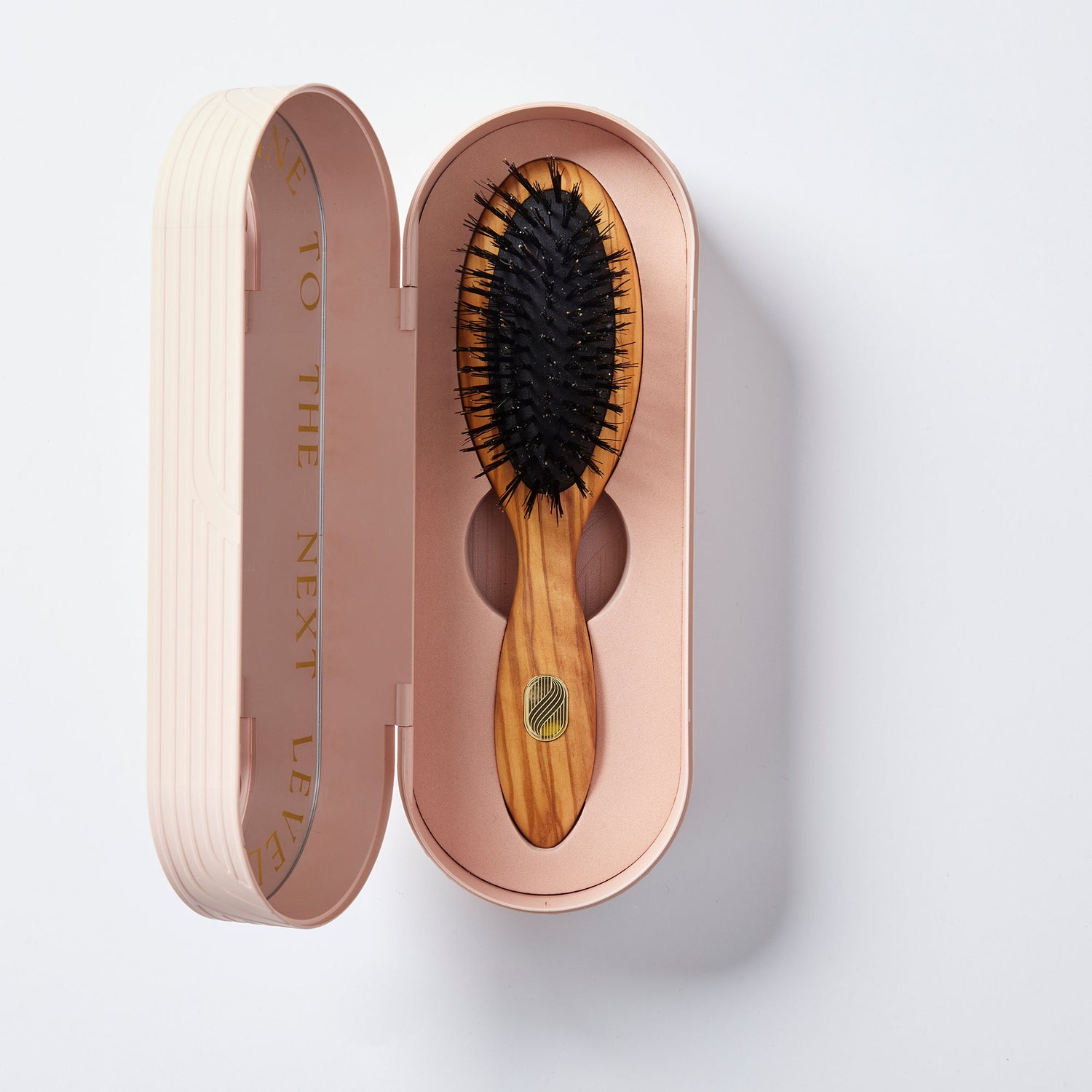 Image of an open Altesse Studio Beaute Petite Repair & Shine Brush for Fine to Medium Hair