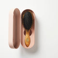 Image of an open Altesse Studio Beaute Classic Repair & Shine Brush for Fine to Medium Hair