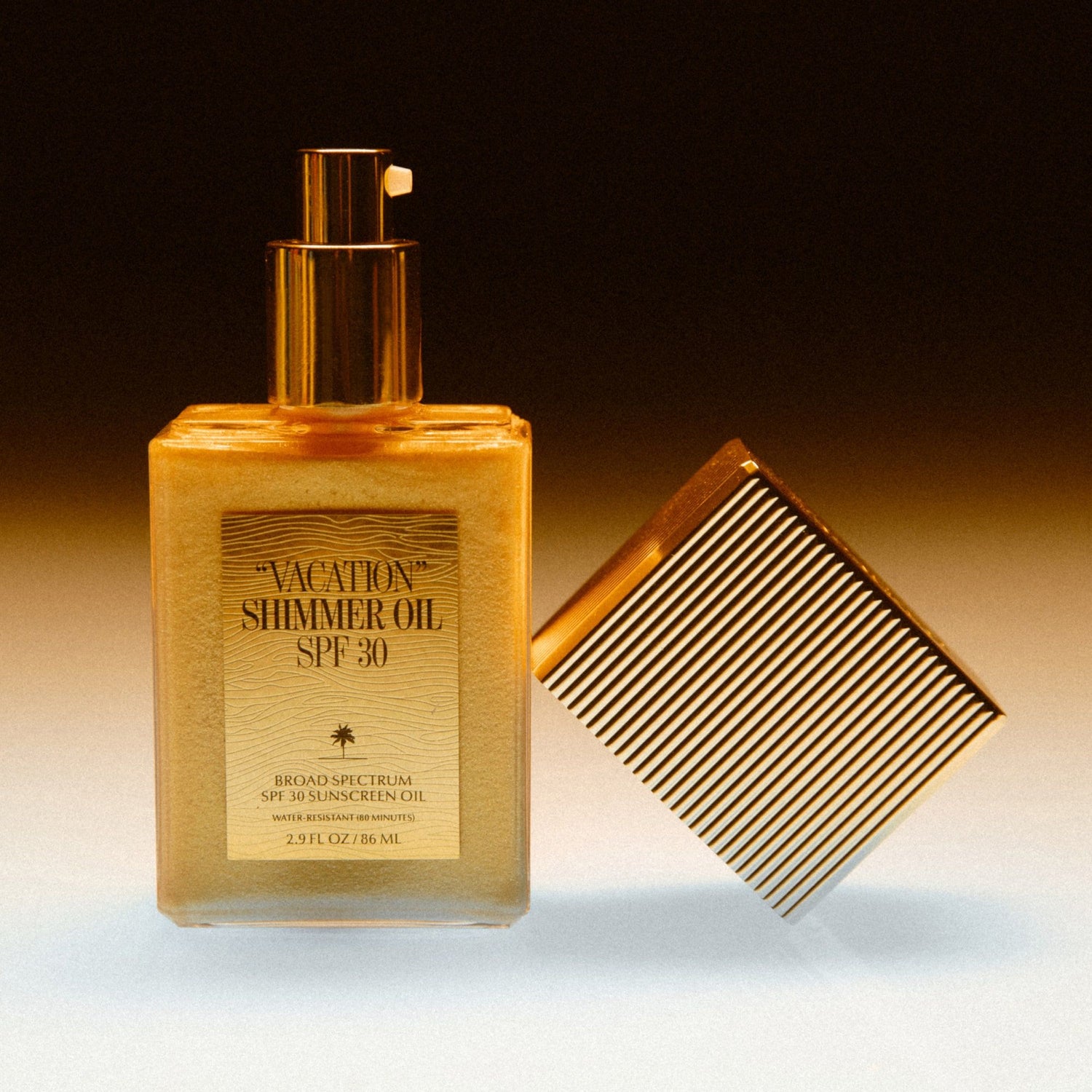 Image of an open  "Vacation” Shimmer Oil SPF 30