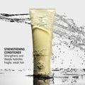 Lifestyle image of Oribe Hair Alchemy Strengthening Conditioner for Fragile & Weak Hair