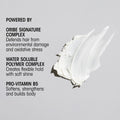 A white smear of Oribe Rough Luxury Soft Molding Paste sits next to ingredients for environmental defense, a flexible hold polymer complex for shine, and Pro-Vitamin B5 for softening and strengthening.