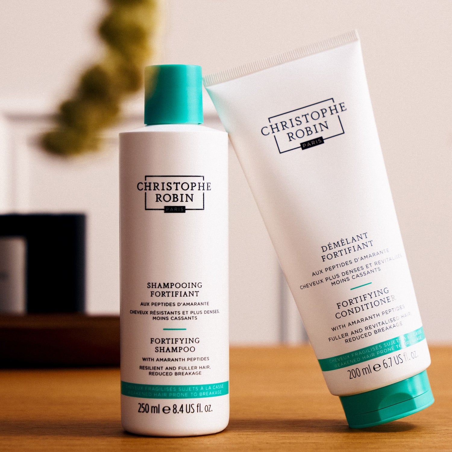 Lifestyle image of Christophe Robin Fortifying Conditioner with Amaranth Peptides