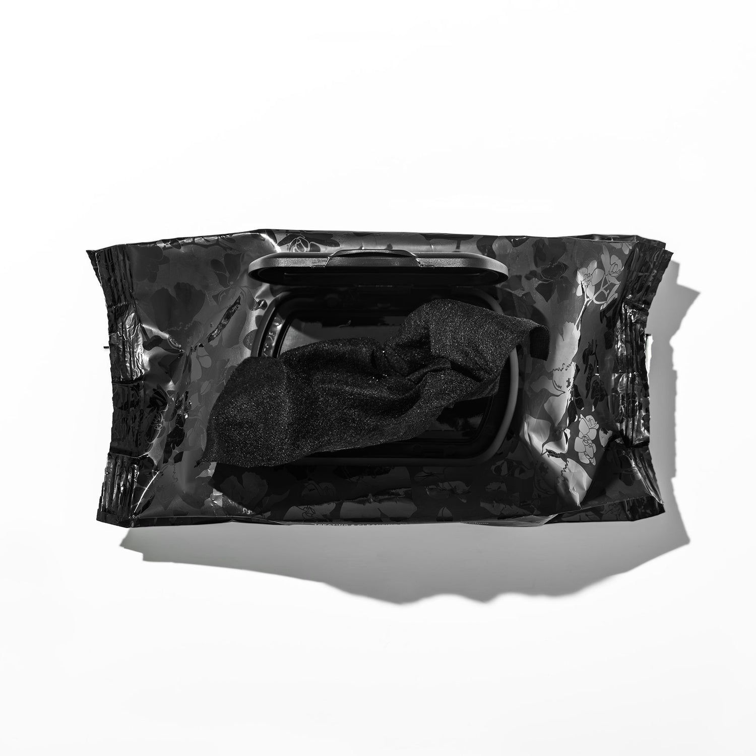 Image of an open Nannette de Gaspé Essence Noir Cleansing and Treating Facial Cloths