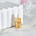 Lifestyle image of Chantecaille Gold Recovery Intense Concentrate A.M.