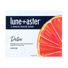 A rectangular packet of the Lune+Aster 5 Minute Rescue Mask Detox, featuring an illustration of a grapefruit slice designed to cleanse skin.