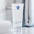 Lifestyle image of IS Clinical Cream Cleanser