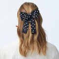 Model image of Lele Sadoughi Jet Pearl Embellished Antoinette Bow Barrette