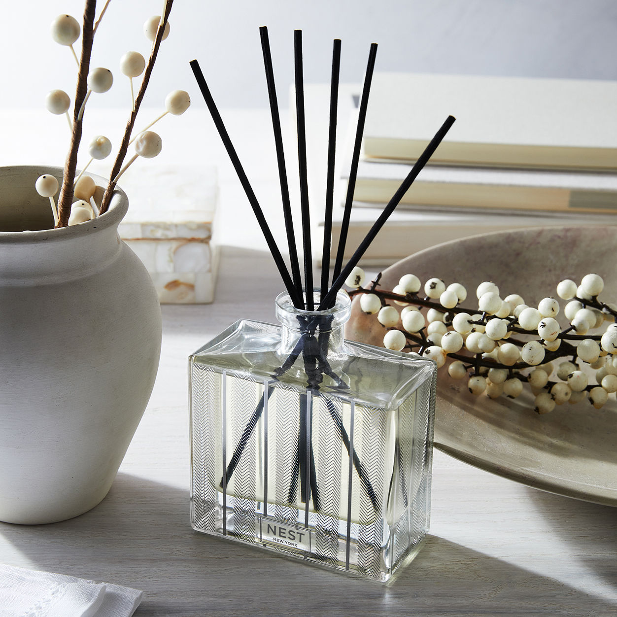 Lifestyle image of Nest Blue Cypress and Snow Reed Diffuser (Limited Edition)