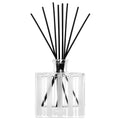 Image of an open Nest Santorini Olive and Citron Reed Diffuser