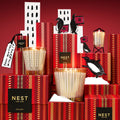 Lifestyle image of Nest Holiday Votive Ornament Candle (Limited Edition)